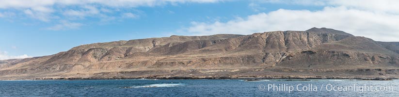 Geologic Terraces, San Clemente Island.  Multiple terraces on the island are seen, formed as the ocean level changes over eons. Panoramic photo