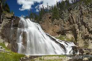 Gibbon Falls drops 80 feet through a deep canyon formed by the Gibbon River. Although visible from the road above, the best vantage point for viewing the falls is by hiking up the river itself, Yellowstone National Park, Wyoming