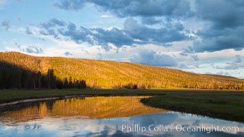 Sunrise and clouds above the Gibbon River, Gibbon Meadows, Yellowstone National Park, Wyoming