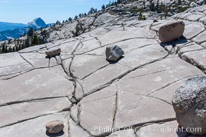 Glacial erratics atop Olmsted Point. Erratics are huge boulders left behind by the passing of glaciers which carved the granite surroundings into their present-day form, Yosemite National Park, California
