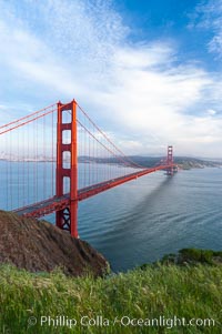 Golden Gate Bridge, viewed from the Marin Headlands with the city of San Francisco in the distance.  Late afternoon