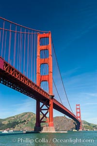 Golden Gate Bridge, viewed from Fort Point, with the Marin Headlands visible in the distance.  San Francisco