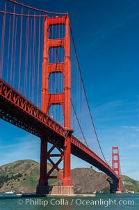 Golden Gate Bridge, viewed from Fort Point, with the Marin Headlands visible in the distance.  San Francisco