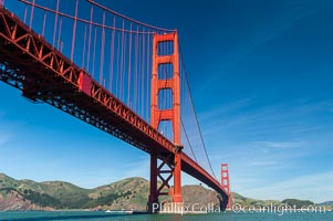 Golden Gate Bridge, viewed from Fort Point, with the Marin Headlands visible in the distance.  San Francisco