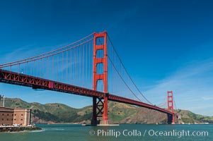 Golden Gate Bridge, viewed from Fort Point, with the Marin Headlands visible in the distance.  San Francisco