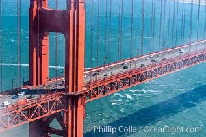 Commuter traffic crosses the Golden Gate Bridge, viewed from the Marin Headlands. San Francisco