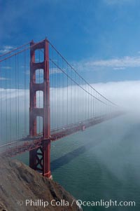 Golden Gate Bridge, viewed from the Marin Headlands with the city of San Francisco in the distance.  Late afternoon