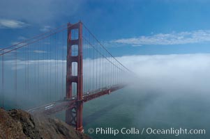 Golden Gate Bridge, viewed from the Marin Headlands with the city of San Francisco in the distance.  Late afternoon