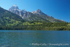 The Teton Range rises above Taggart Lake, Grand Teton National Park, Wyoming