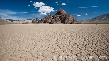The Grandstand, standing above dried mud flats, on the Racetrack Playa in Death Valley, Death Valley National Park, California