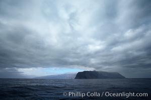 Guadalupe Island, dark and gloomy clouds, northern approach.