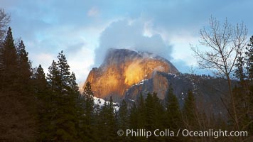 Half Dome and storm clouds at sunset, viewed from Sentinel Bridge, Yosemite National Park, California