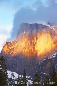 Half Dome and storm clouds at sunset, viewed from Sentinel Bridge, Yosemite National Park, California