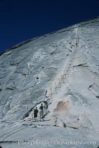 Cables guiding hikers to summit of Half Dome, Yosemite National Park, California