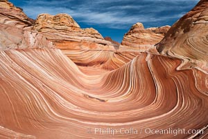 The Wave, an area of fantastic eroded sandstone featuring beautiful swirls, wild colors, countless striations, and bizarre shapes set amidst the dramatic surrounding North Coyote Buttes of Arizona and Utah.  The sandstone formations of the North Coyote Buttes, including the Wave, date from the Jurassic period. Managed by the Bureau of Land Management, the Wave is located in the Paria Canyon-Vermilion Cliffs Wilderness and is accessible on foot by permit only