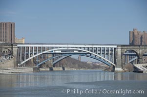 High Bridge, Harlem River.  The oldest remaining bridge in NYC is High Bridge which carries the Croton Aquaduct.  The Alexander Hamilton Bridge and Washington Bridge are seen beyond it.  Manhattan is on the left, the Bronx is on the right, New York City