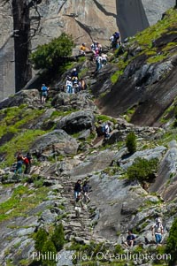 Hikers climb the Mist Trail hrough Little Yosemite Valley.  Spring, Yosemite National Park, California