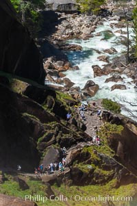 Hikers climb the Mist Trail hrough Little Yosemite Valley.  Spring, Yosemite National Park, California