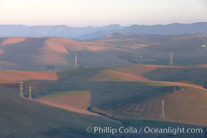 Hills between Morro Bay and Atascadero, early morning light, power transmission lines and signal attenae