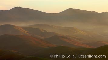 Hills between Morro Bay and Atascadero, early morning light, power transmission lines and signal attenae