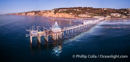 Holiday Christmas Lights on Scripps Pier, Blacks Beach and Scripps Institution of Oceanography, sunset, aerial, La Jolla, California