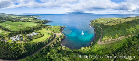 Honolua Bay in West Maui aerial photo, morning, with snorkel boat at anchor, panorama