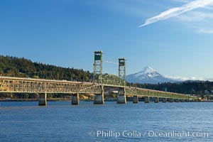 The Hood River Bridge is a truss bridge with a vertical lift that spans the Columbia River between Hood River, Oregon and White Salmon, Washington.  The bridge is currently the second oldest road bridge across the Columbia between Washington and Oregon. It was built by the Oregon-Washington Bridge Company and opened on December 9, 1924. The original name was the Waucoma Interstate Bridge