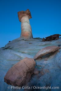 Pedestal rock, or hoodoo, at Stud Horse Point.  These hoodoos form when erosion occurs around but not underneath a more resistant caprock that sits atop of the hoodoo spire, Page, Arizona