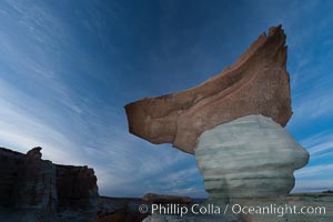 Pedestal rock, or hoodoo, at Stud Horse Point.  These hoodoos form when erosion occurs around but not underneath a more resistant caprock that sits atop of the hoodoo spire, Page, Arizona