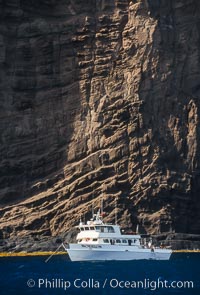 Boat Horizon below eastern cliffs of Isla Afuera, sunrise, Guadalupe Island (Isla Guadalupe)