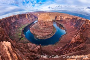 Horseshoe Bend. The Colorado River makes a 180-degree turn at Horseshoe Bend. Here the river has eroded the Navajo sandstone for eons, digging a canyon 1100-feet deep, Page, Arizona