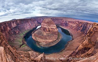 Horseshoe Bend. The Colorado River makes a 180-degree turn at Horseshoe Bend. Here the river has eroded the Navajo sandstone for eons, digging a canyon 1100-feet deep, Page, Arizona