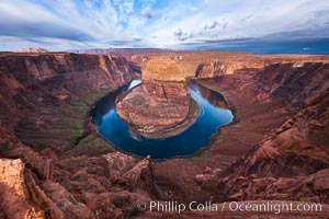 Horseshoe Bend. The Colorado River makes a 180-degree turn at Horseshoe Bend. Here the river has eroded the Navajo sandstone for eons, digging a canyon 1100-feet deep, Page, Arizona