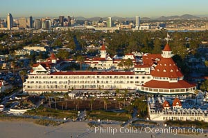 Hotel del Coronado, known affectionately as the Hotel Del.  It was once the largest hotel in the world, and is one of the few remaining wooden Victorian beach resorts.  It sits on the beach on Coronado Island, seen here with downtown San Diego in the distance.  It is widely considered to be one of Americas most beautiful and classic hotels. Built in 1888, it was designated a National Historic Landmark in 1977