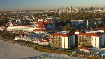 Hotel del Coronado, known affectionately as the Hotel Del.  It was once the largest hotel in the world, and is one of the few remaining wooden Victorian beach resorts.  It sits on the beach on Coronado Island, seen here with downtown San Diego in the distance.  It is widely considered to be one of Americas most beautiful and classic hotels. Built in 1888, it was designated a National Historic Landmark in 1977.