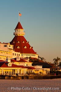 Hotel del Coronado, known affectionately as the Hotel Del. It was once the largest hotel in the world, and is one of the few remaining wooden Victorian beach resorts. It sits on the beach on Coronado Island, seen here with downtown San Diego in the distance. It is widely considered to be one of Americas most beautiful and classic hotels. Built in 1888, it was designated a National Historic Landmark in 1977.