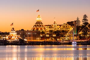 Hotel del Coronado with holiday Christmas night lights, known affectionately as the Hotel Del. It was once the largest hotel in the world, and is one of the few remaining wooden Victorian beach resorts.  The Hotel Del is widely considered to be one of Americas most beautiful and classic hotels. Built in 1888, it was designated a National Historic Landmark in 1977