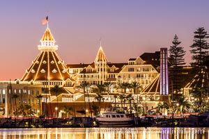 Hotel del Coronado with holiday Christmas night lights, known affectionately as the Hotel Del. It was once the largest hotel in the world, and is one of the few remaining wooden Victorian beach resorts.  The Hotel Del is widely considered to be one of Americas most beautiful and classic hotels. Built in 1888, it was designated a National Historic Landmark in 1977