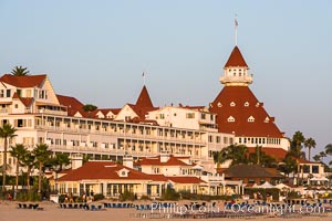 Hotel del Coronado, known affectionately as the Hotel Del. It was once the largest hotel in the world, and is one of the few remaining wooden Victorian beach resorts. It sits on the beach on Coronado Island, seen here with downtown San Diego in the distance. It is widely considered to be one of Americas most beautiful and classic hotels. Built in 1888, it was designated a National Historic Landmark in 1977