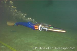 A human-powered submarine, composed off a streamlined casing which encloses half the operator as well as his air supply.  The operator kicks a single large monofin to propel the sleek submersible.  It was designed, built and operated by Virginia Tech engineering students, Offshore Model Basin, Escondido, California