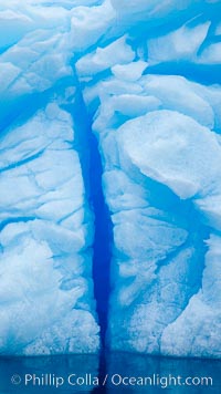 Iceberg detail.  Cracks and melt patterns.  Blue ice.