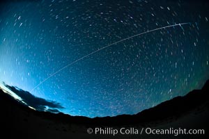 The International Space Station flys over Death Valley shortly after sunset.