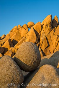 Jumbo Rocks at sunset, warm last light falling on the boulders, Joshua Tree National Park, California