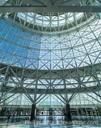 Los Angeles Convention Center, south hall, interior design exhibiting exposed space frame steel beams and glass enclosure.