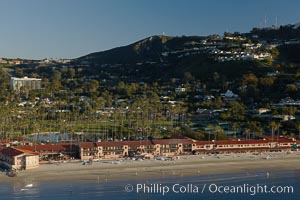 La Jolla Beach and Tennis Club, located on La Jolla Shores Beach with Mount Soledad rises in the background