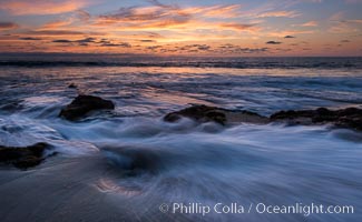 La Jolla coast sunset, waves wash over sandstone reef, clouds and sky