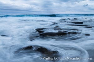 La Jolla reef and clouds, surf, early morning.