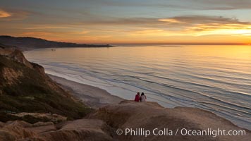 Sunset falls upon Torrey Pines State Reserve, viewed from the Torrey Pines glider port.  La Jolla, Scripps Institution of Oceanography and Scripps Pier are seen in the distance