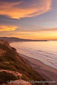 Sunset falls upon Torrey Pines State Reserve, viewed from the Torrey Pines glider port.  La Jolla, Scripps Institution of Oceanography and Scripps Pier are seen in the distance.