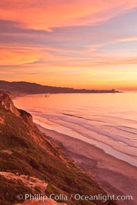 Sunset falls upon Torrey Pines State Reserve, viewed from the Torrey Pines glider port.  La Jolla, Scripps Institution of Oceanography and Scripps Pier are seen in the distance